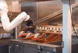 Robots cook your burger and fries at this new California fast food restaurant