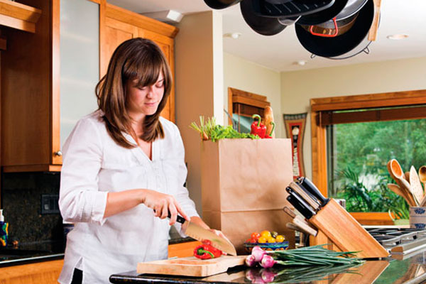 Woman Cutting Veggies